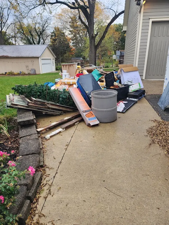 Dumpster being loaded with debris for Demolition Dumpster Rental in Fruitridge Pocket
